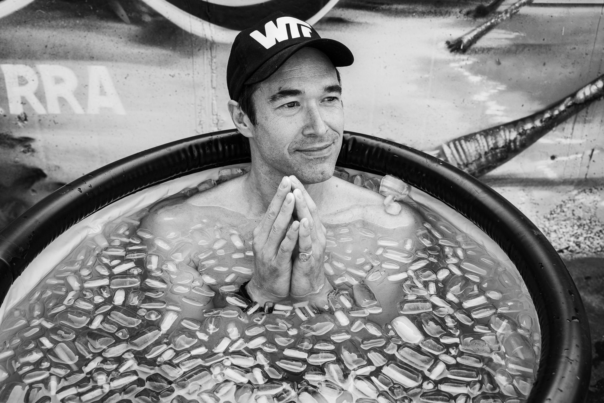 Gregory immersed in an outdoor ice bath.