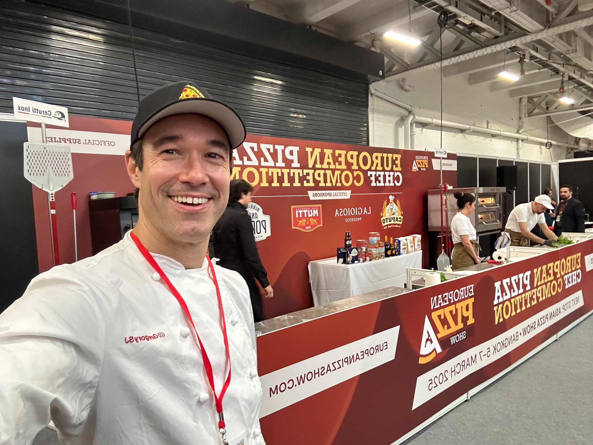 Gregory at the European Pizza Championship stand.