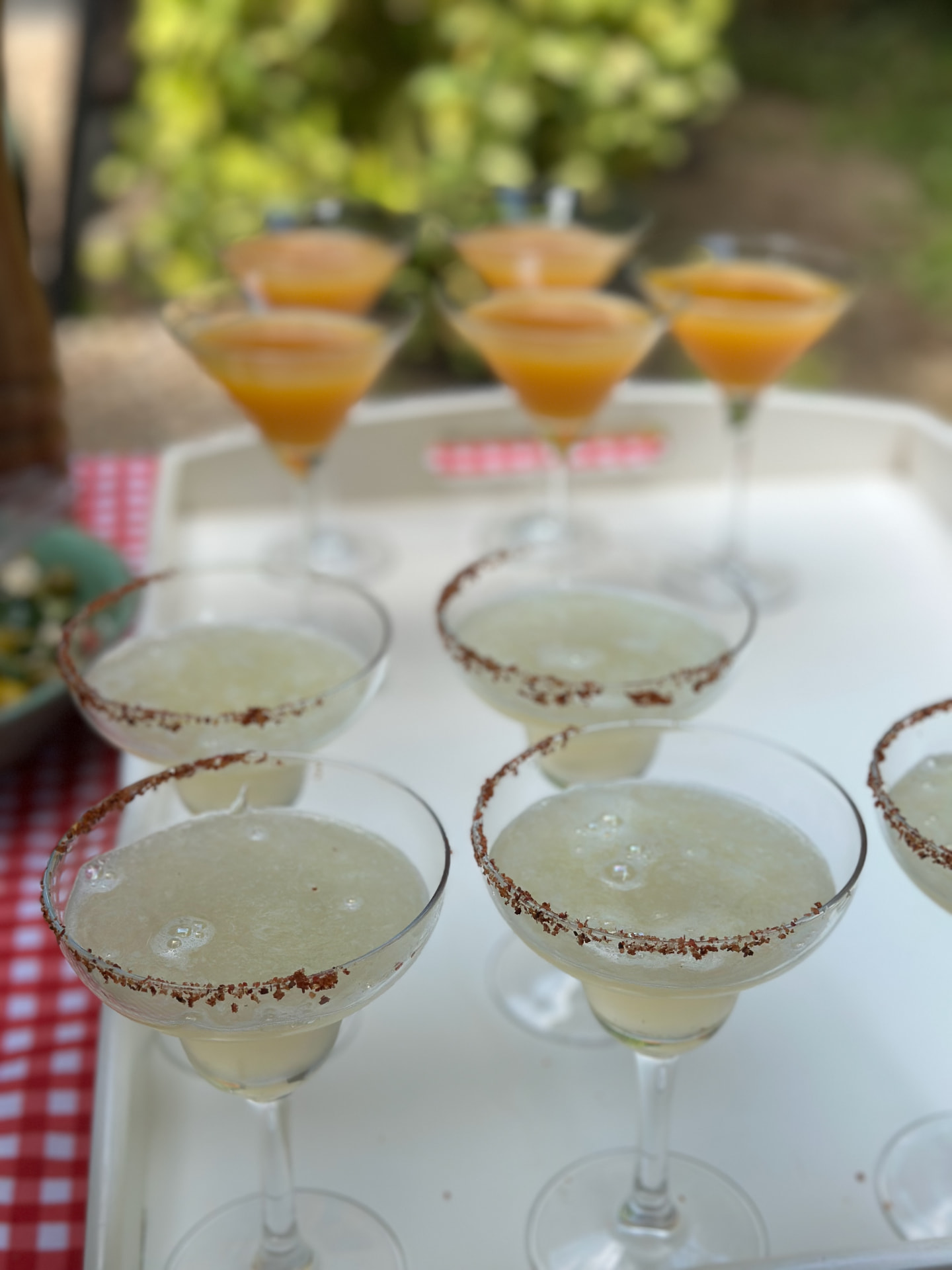 Trays of freshly prepared margaritas ready for guests.