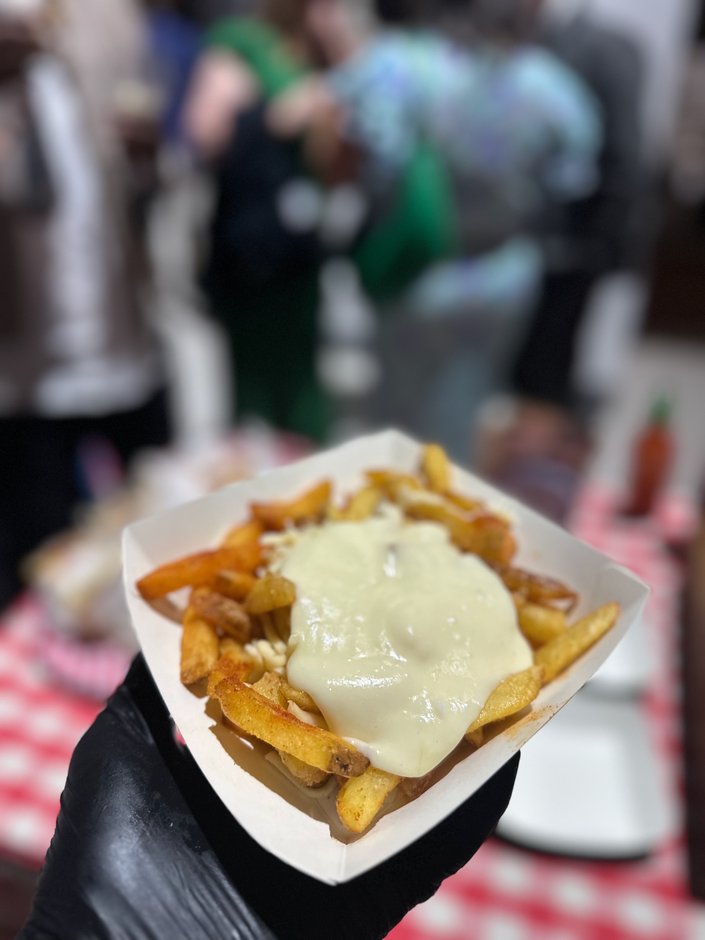 Crisp fries generously covered with melted cheese.
